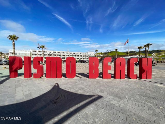 a view of a ocean with a mountain