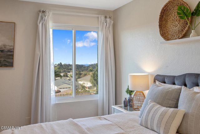 a view of a yard with sitting area