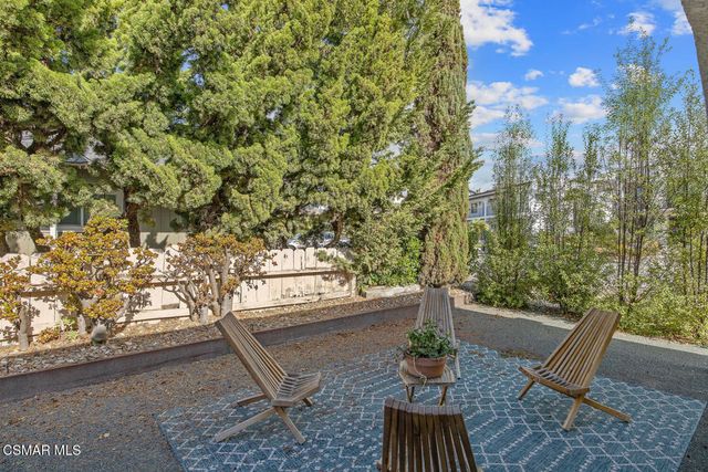 a kitchen with a white cabinets and a stove