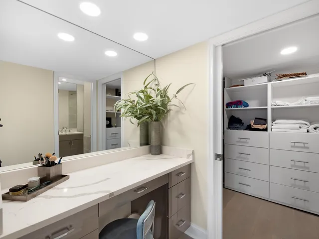 a kitchen with a table and chairs in it