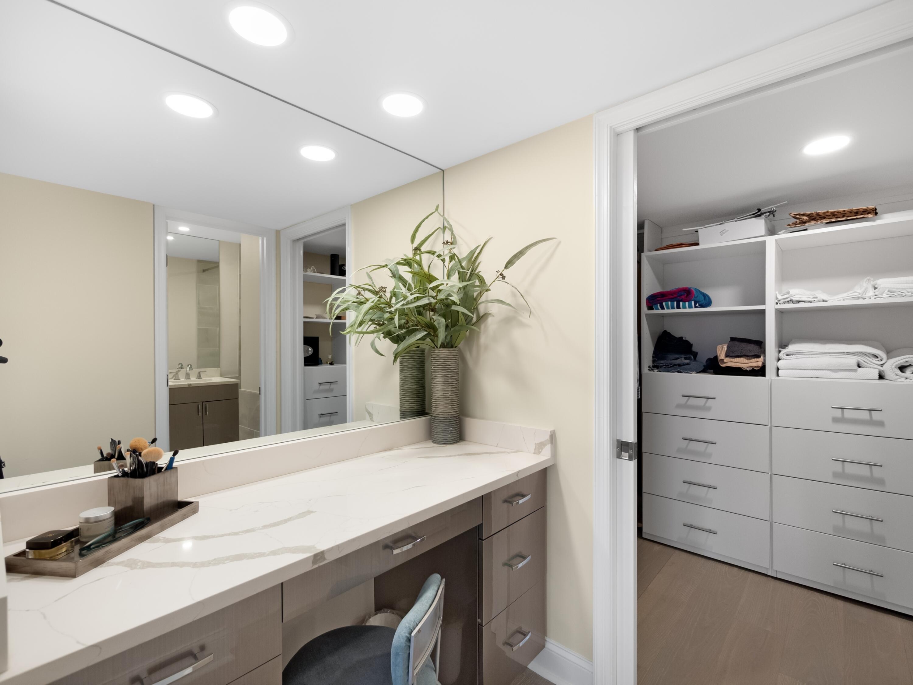 4161 U.S. Highway 1, Unit N1 Jupiter, FL 33477 - Photo 10 of 18 a kitchen with a table and chairs in it