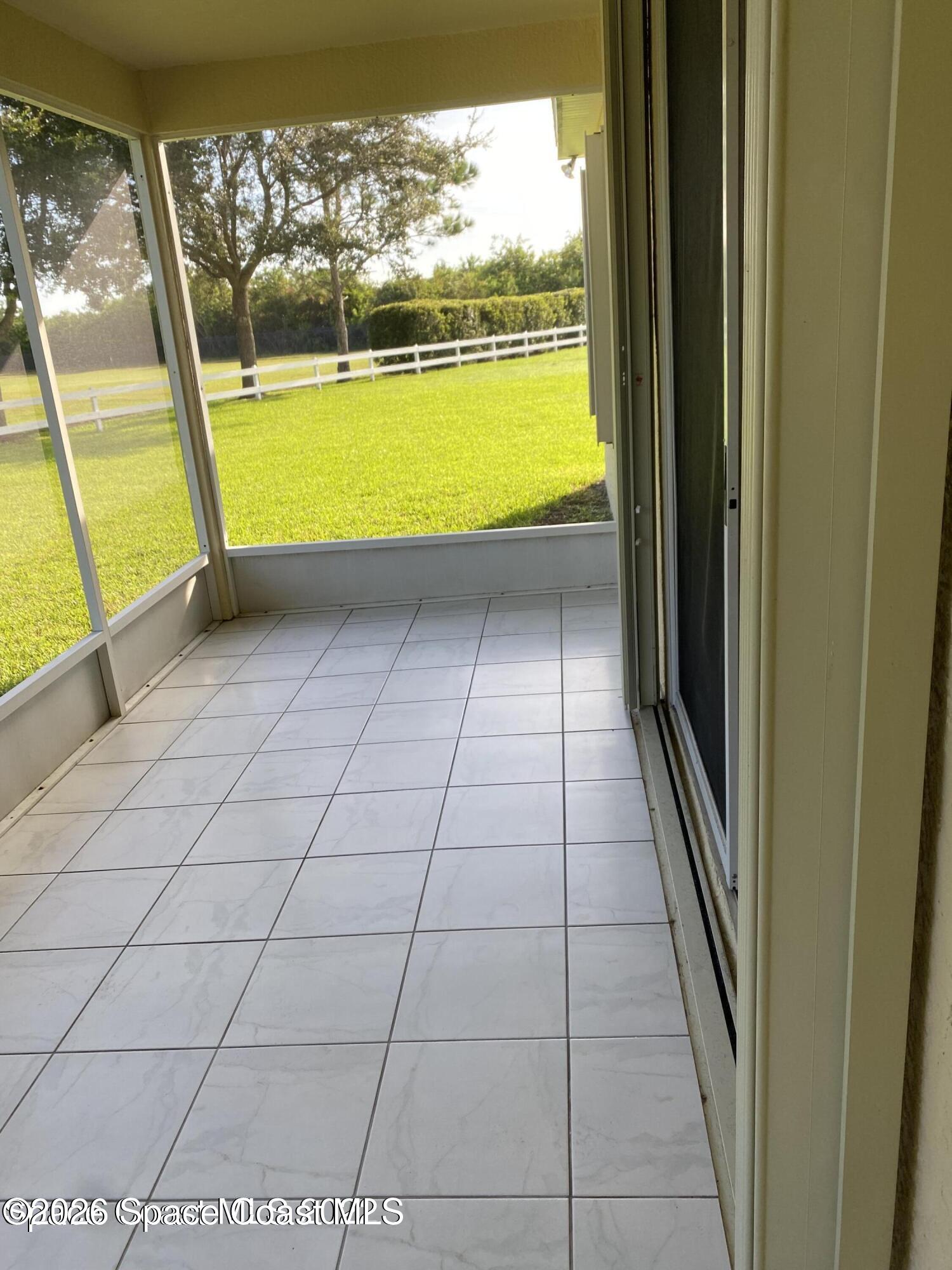 5144 Ivory Way Melbourne, FL 32940 - Photo 12 of 13 Screened in Patio 2
