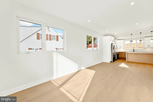 a view of a kitchen with furniture and a kitchen