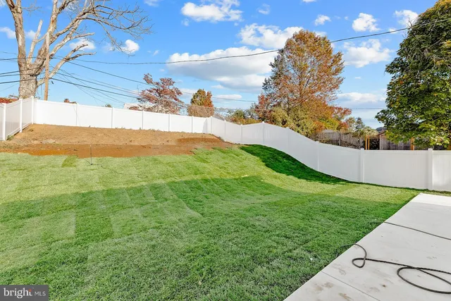 a view of a yard with an outdoor space