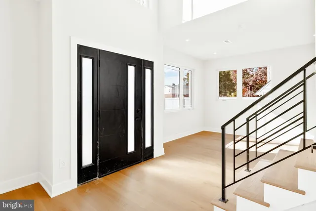 a view of entryway with stairs