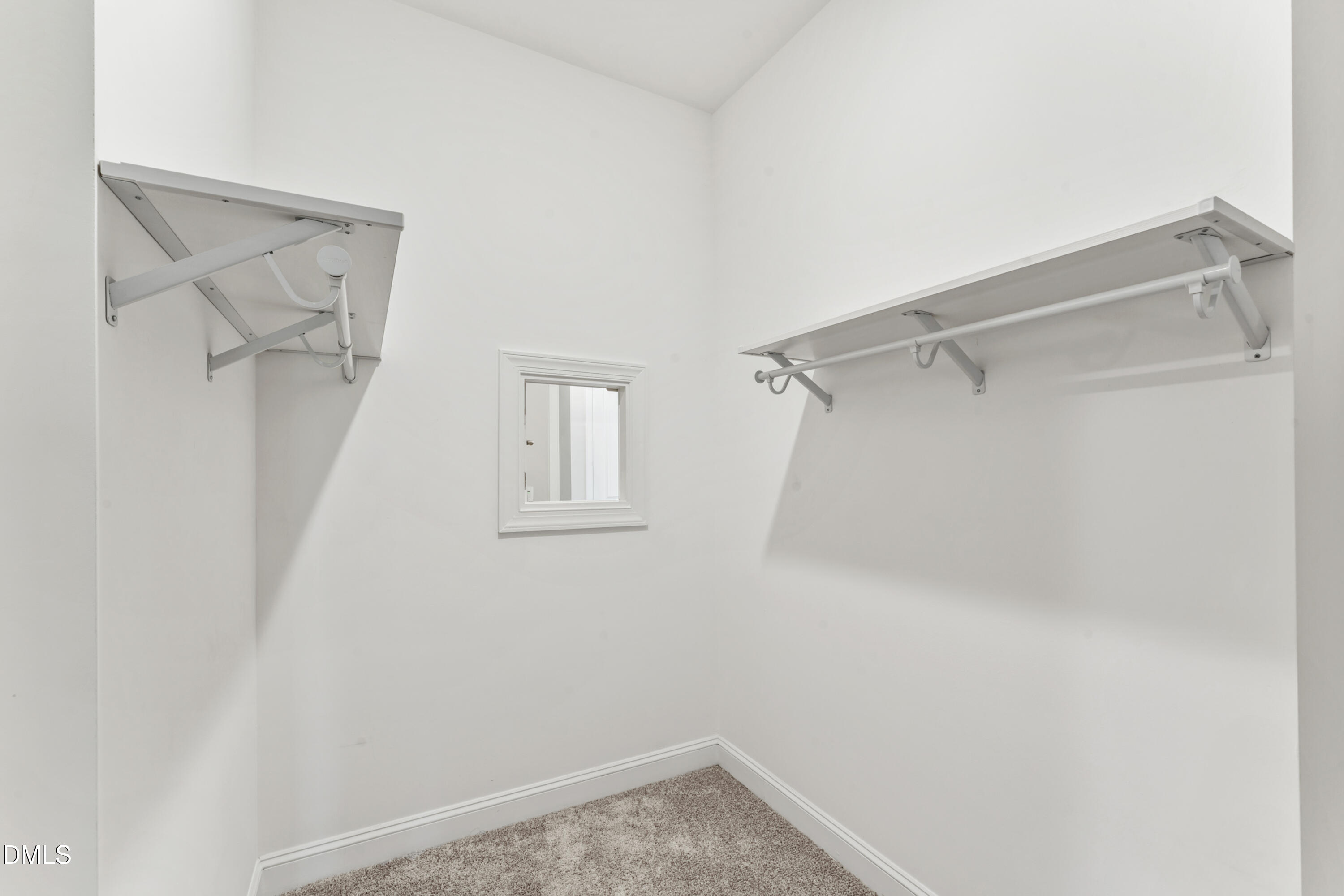 125 Damsire Way Cary, NC 27513 - Photo 31 of 54 Primary Closet connected to Laundry Room