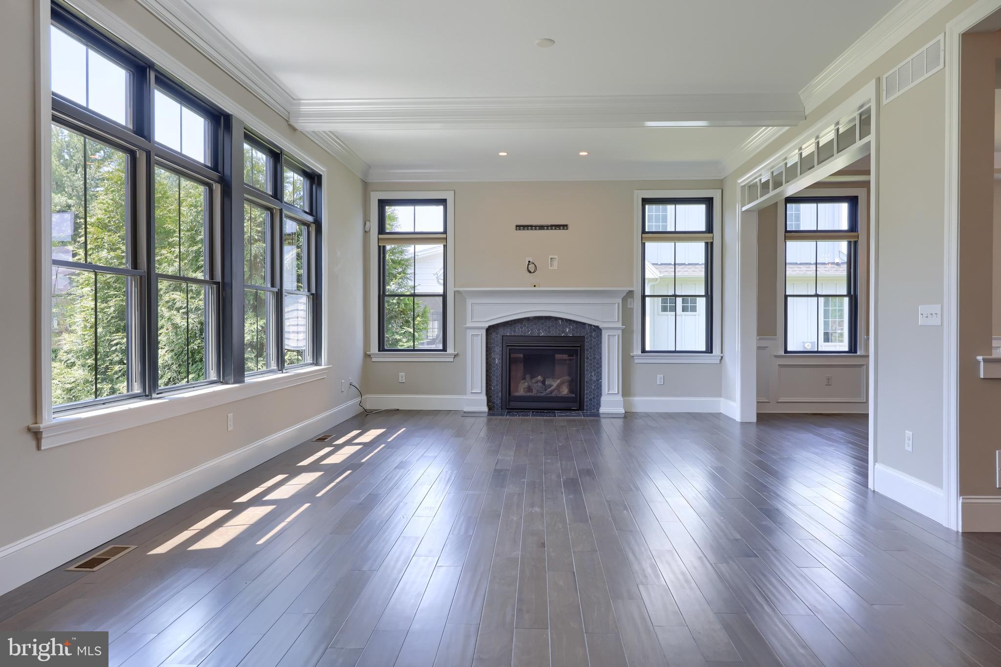 428 Southampton Drive Lititz, PA 17543 - Photo 4 of 60 a view of livingroom with hardwood floor and a fireplace