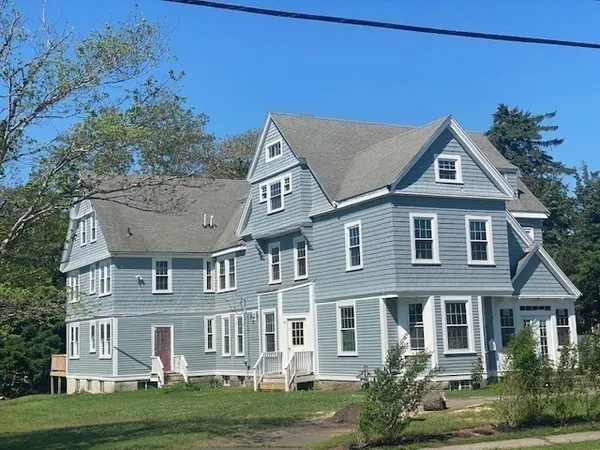 a house view with a garden space