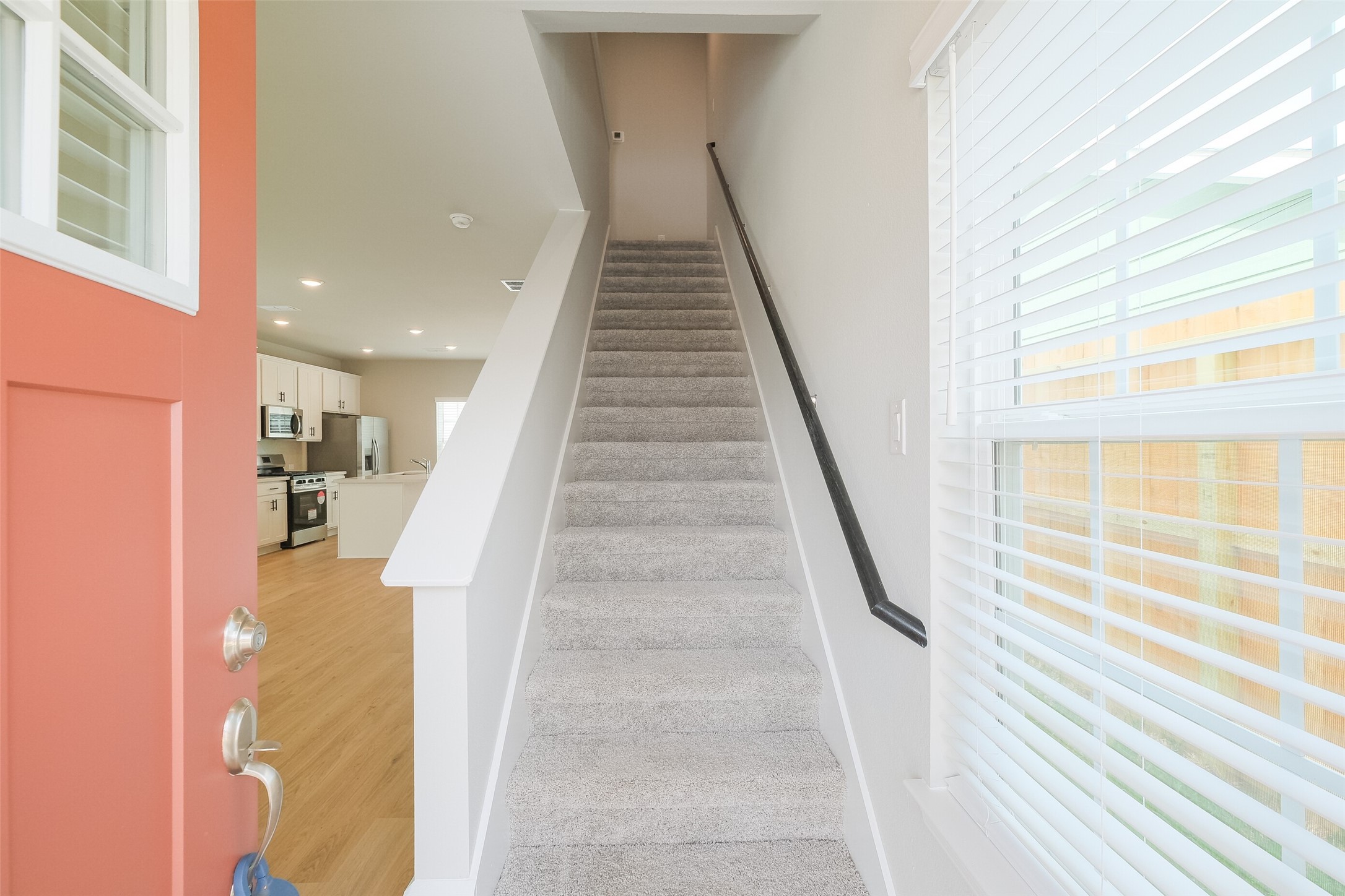 6434 New York Street Houston, TX 77021 - Photo 3 of 26 a view of entryway and hall with wooden floor