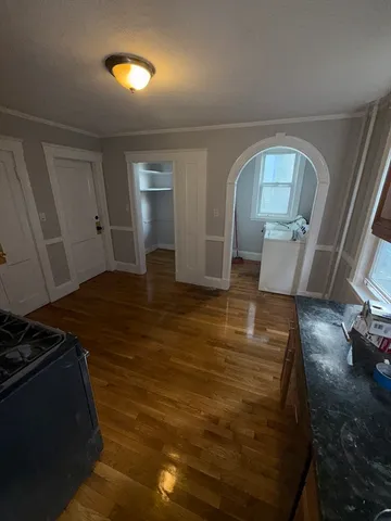 a view of a livingroom with wooden floor