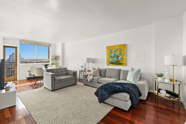a living room with furniture and a couch