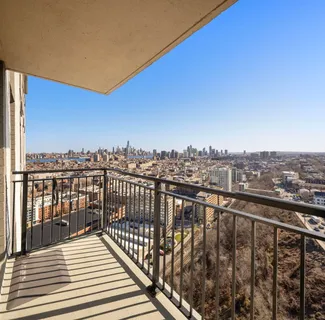 a view of city from a balcony