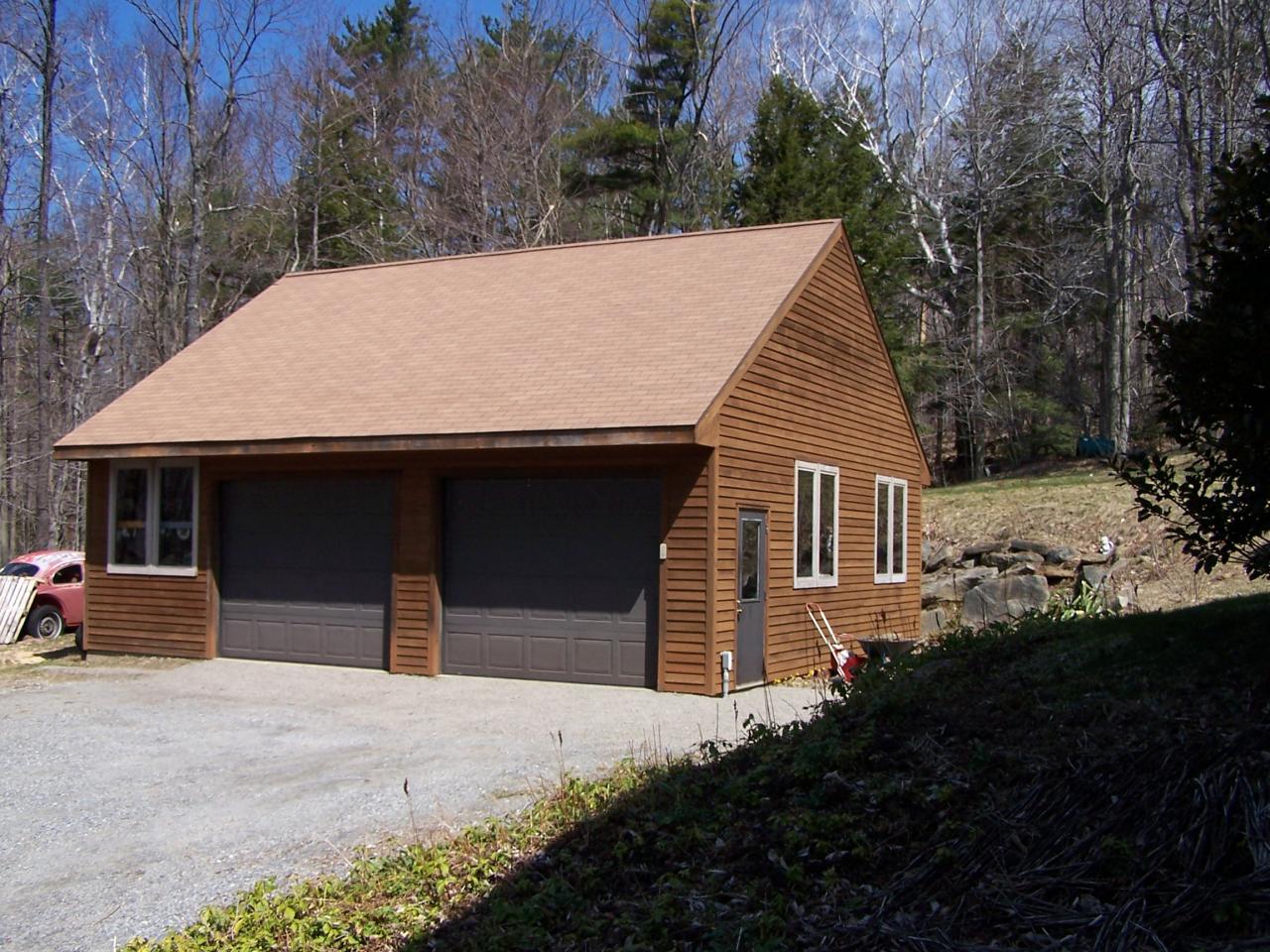 1330 Jacobs Ladder Road Becket, MA 01223 - Photo 2 of 15 a view of house with backyard and garden