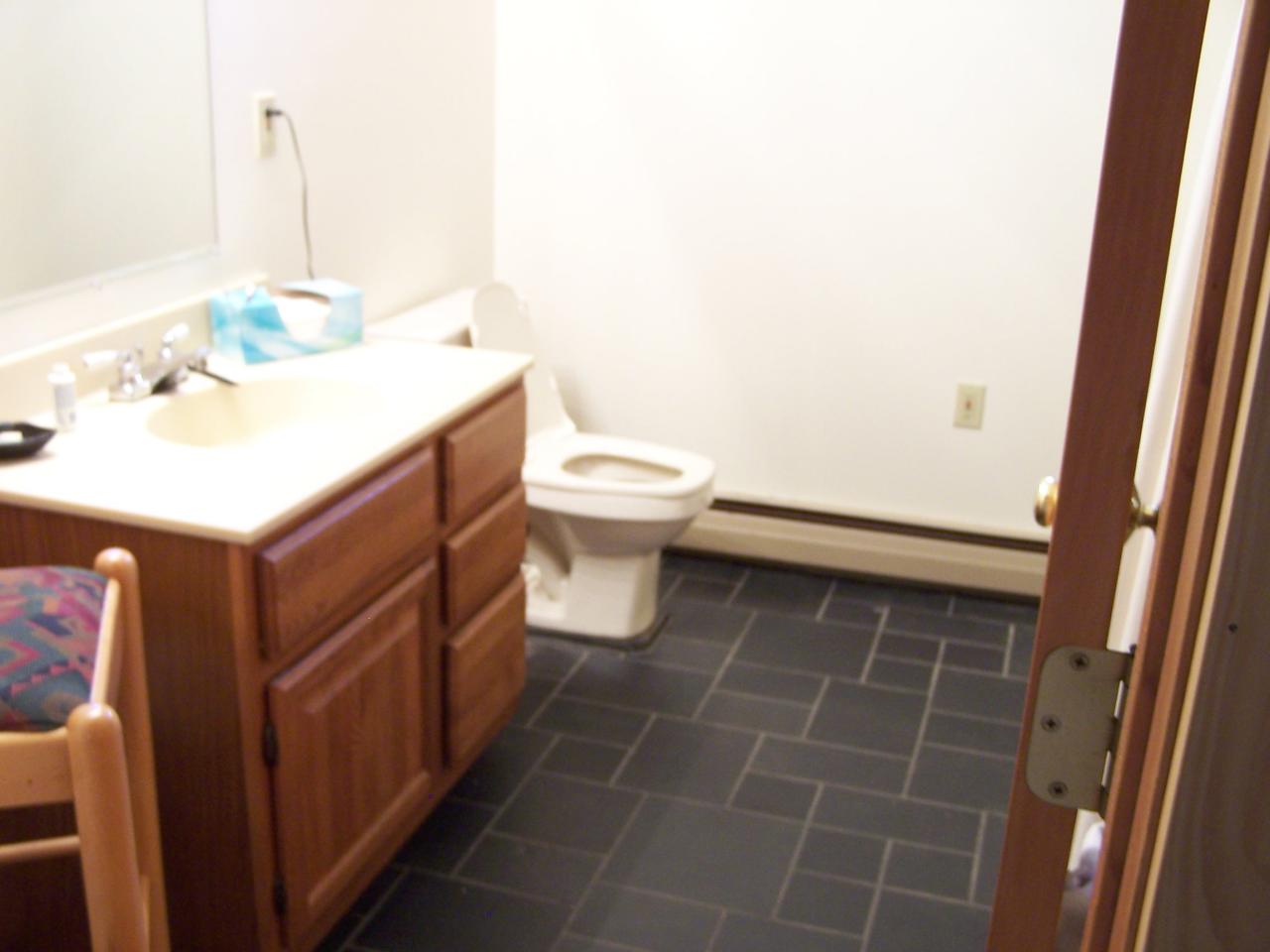 1330 Jacobs Ladder Road Becket, MA 01223 - Photo 11 of 15 a bathroom with a sink a toilet and a mirror