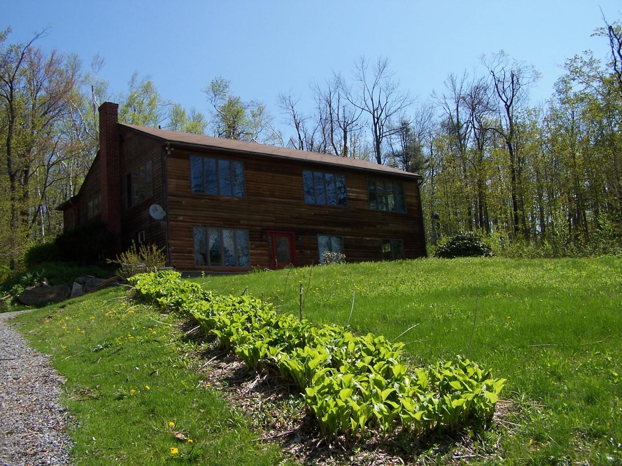 1330 Jacobs Ladder Road Becket, MA 01223 - Photo 15 of 15 a view of house with backyard
