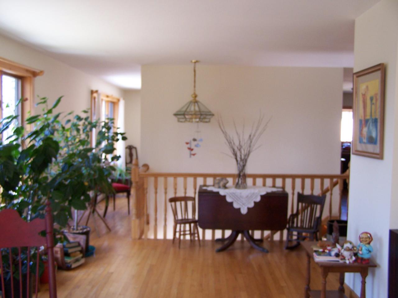 1330 Jacobs Ladder Road Becket, MA 01223 - Photo 4 of 15 a view of a dining room with furniture and wooden floor