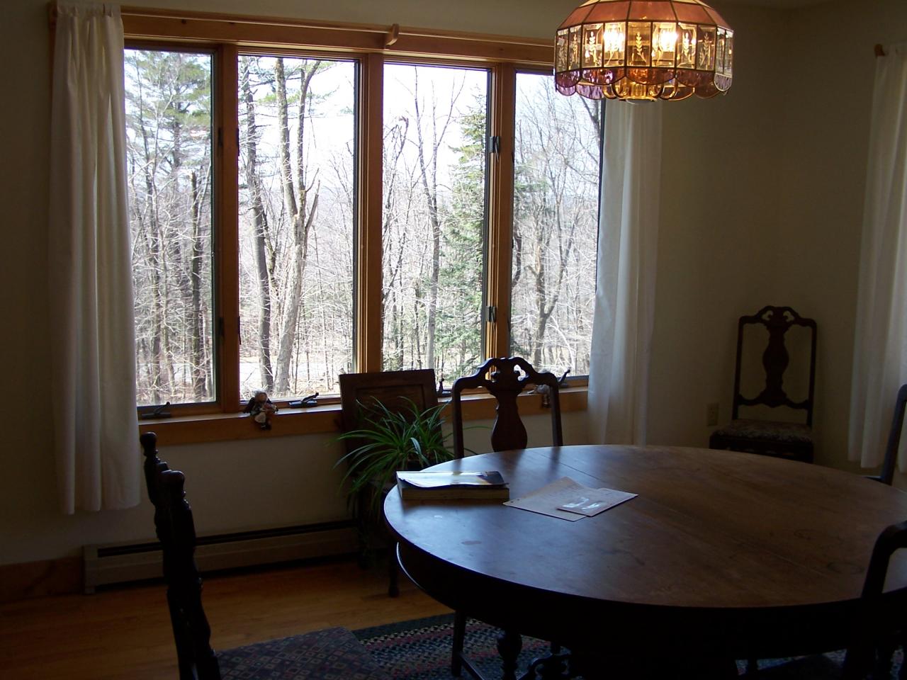 1330 Jacobs Ladder Road Becket, MA 01223 - Photo 7 of 15 a view of a dining room with furniture and window