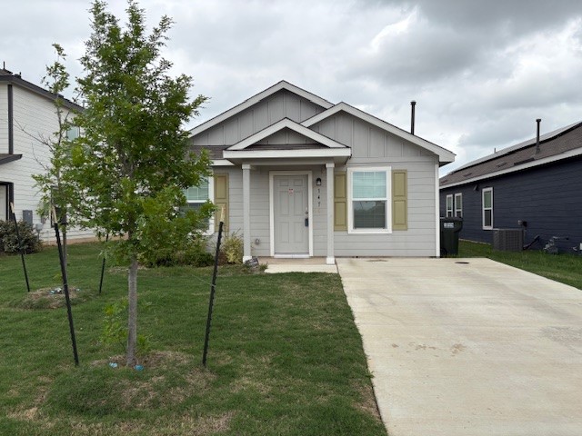 147 Gabbro Gardens Maxwell, TX 78656 - Photo 2 of 14 Single-story residence featuring light gray siding, a covered entry, and olive green window shutters