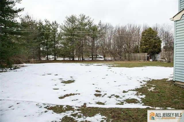 a view of a yard with snow