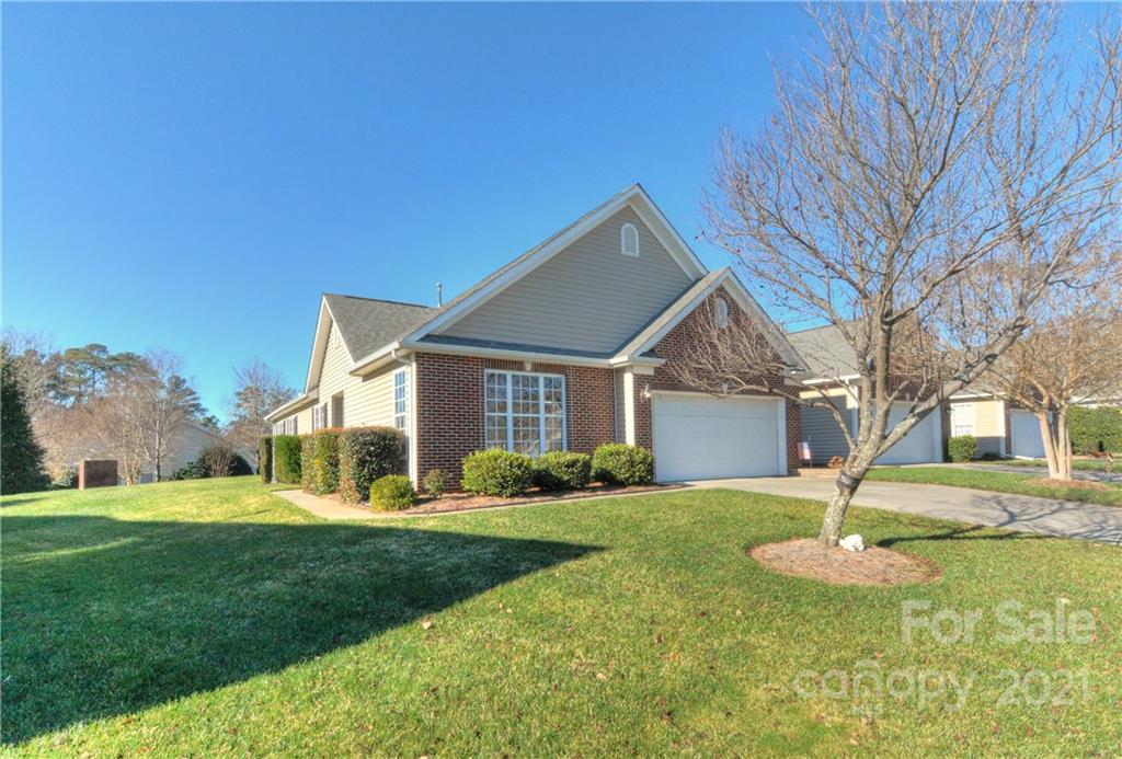 302 Garnet Court, Unit 522 Fort Mill, SC 29708 - Photo 1 of 45 a front view of a house with a yard