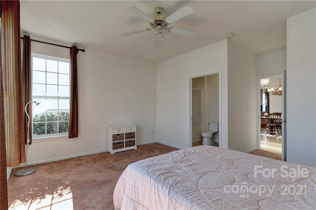 302 Garnet Court, Unit 522 Fort Mill, SC 29708 - Photo 28 of 45 a bedroom with a bed and a window