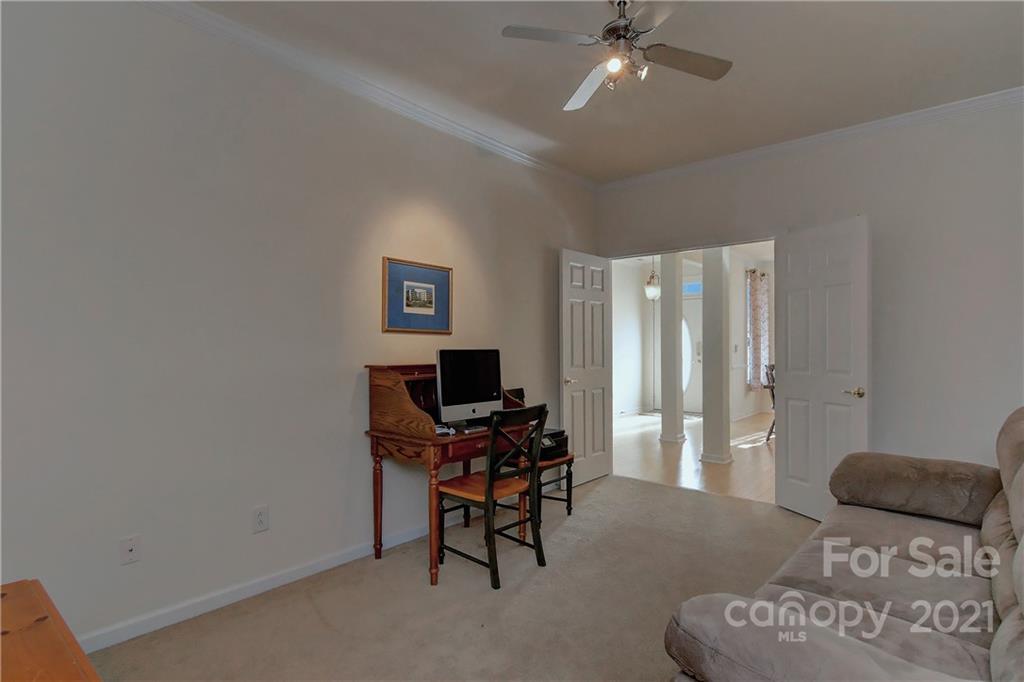 302 Garnet Court, Unit 522 Fort Mill, SC 29708 - Photo 31 of 45 a view of a livingroom with furniture and a window