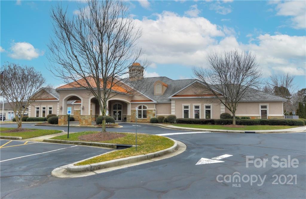 302 Garnet Court, Unit 522 Fort Mill, SC 29708 - Photo 40 of 45 a view of house with outdoor space and swimming pool