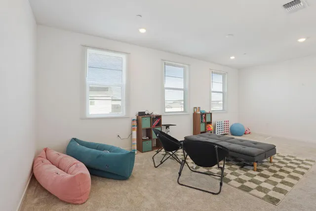 a workspace with furniture and a window