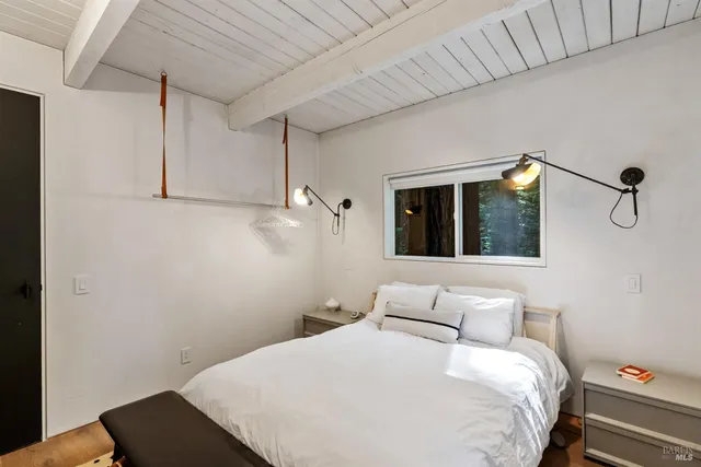 a bathroom with a sink mirror and vanity