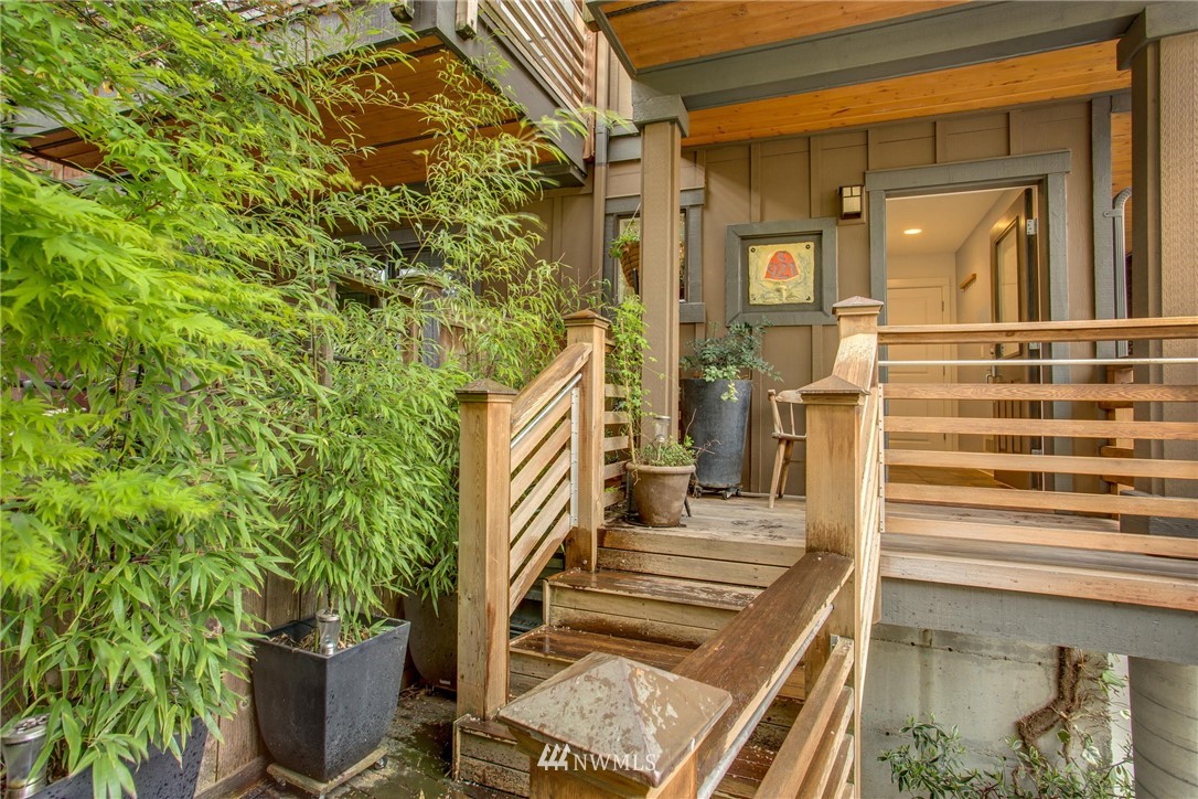 921 North 35th Street, Unit C Seattle, WA 98103 - Photo 1 of 17 a view of outdoor space and deck