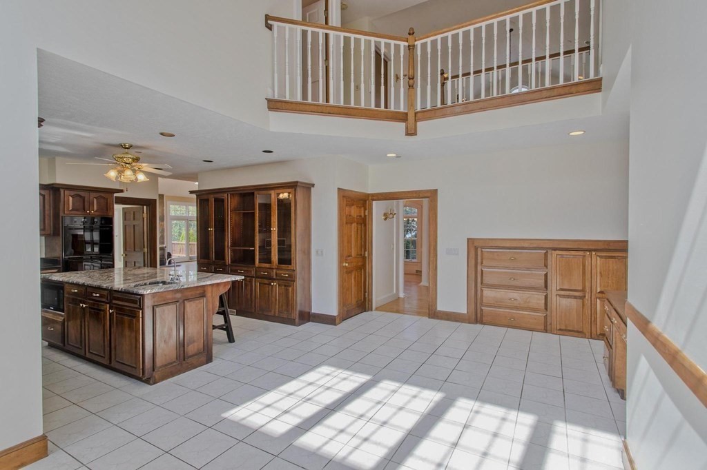 155 Edwards Road Westhampton, MA 01027 - Photo 18 of 39 a large bedroom with bed and wooden floor