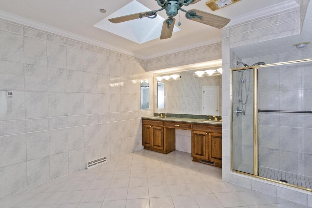 155 Edwards Road Westhampton, MA 01027 - Photo 30 of 39 a large bathroom with a glass shower door and a sink