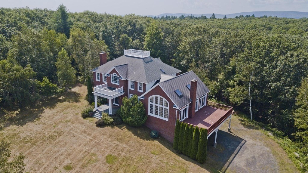 155 Edwards Road Westhampton, MA 01027 - Photo 7 of 39 an aerial view of a house with a garden