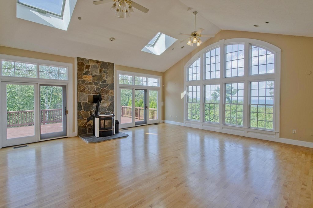 155 Edwards Road Westhampton, MA 01027 - Photo 8 of 39 a view of a livingroom with hardwood floor and a large window