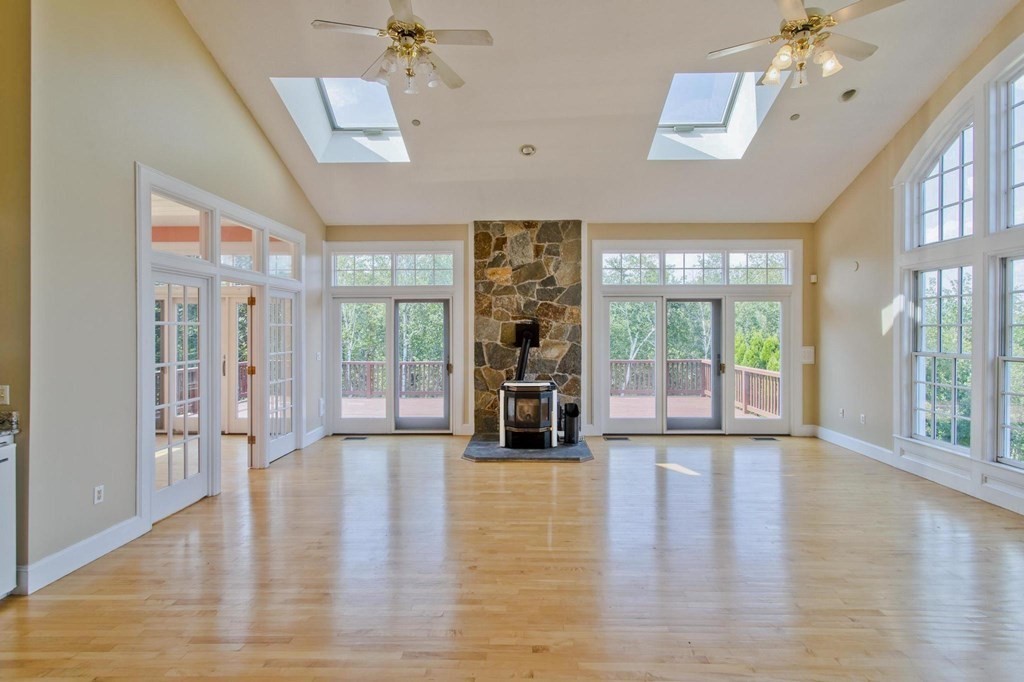155 Edwards Road Westhampton, MA 01027 - Photo 9 of 39 a view of an entryway with wooden floor and windows