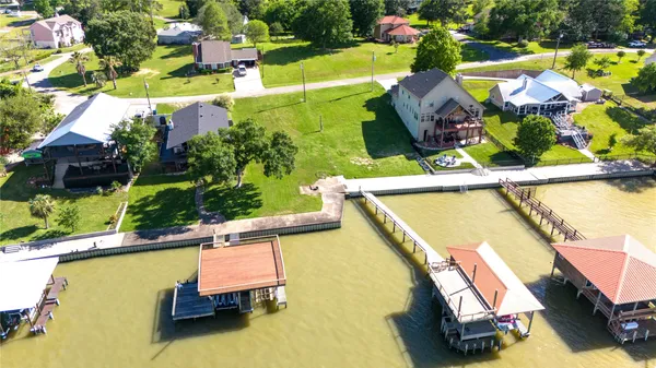an aerial view of a house with a swimming pool
