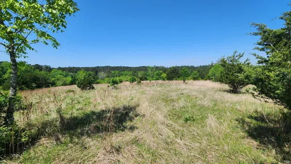 a view of a lake with top of house