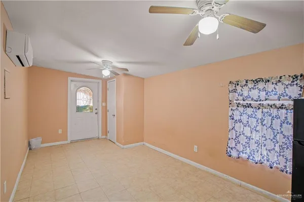 a bedroom with a bed and a cabinets