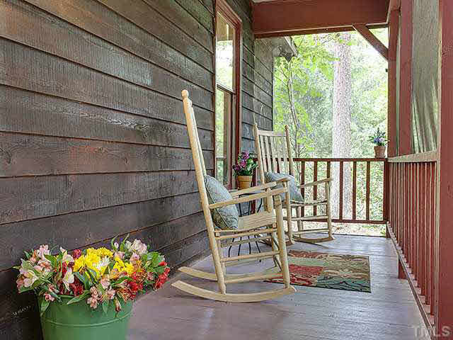 5229 Guess Road Durham, NC 27712 - Photo 3 of 25 Screened front porch is perfect for relaxing. Screened Porch
