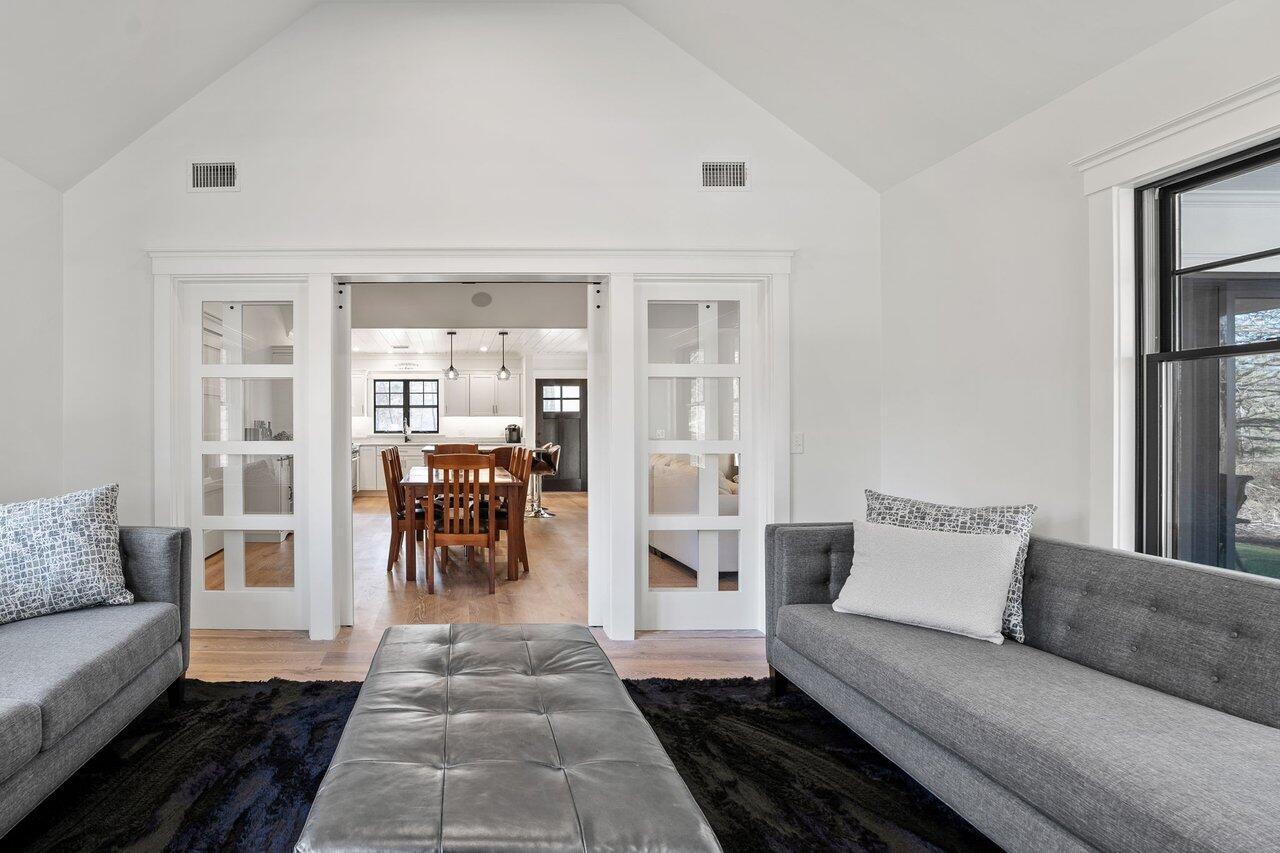 131 Old Barnstable Road Mashpee, MA 02649 - Photo 14 of 93 a living room with furniture and a potted plant