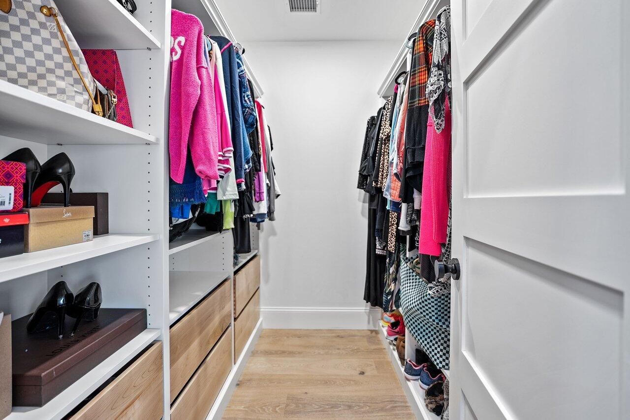 131 Old Barnstable Road Mashpee, MA 02649 - Photo 24 of 93 a view of walk in closet with clothes and shoes