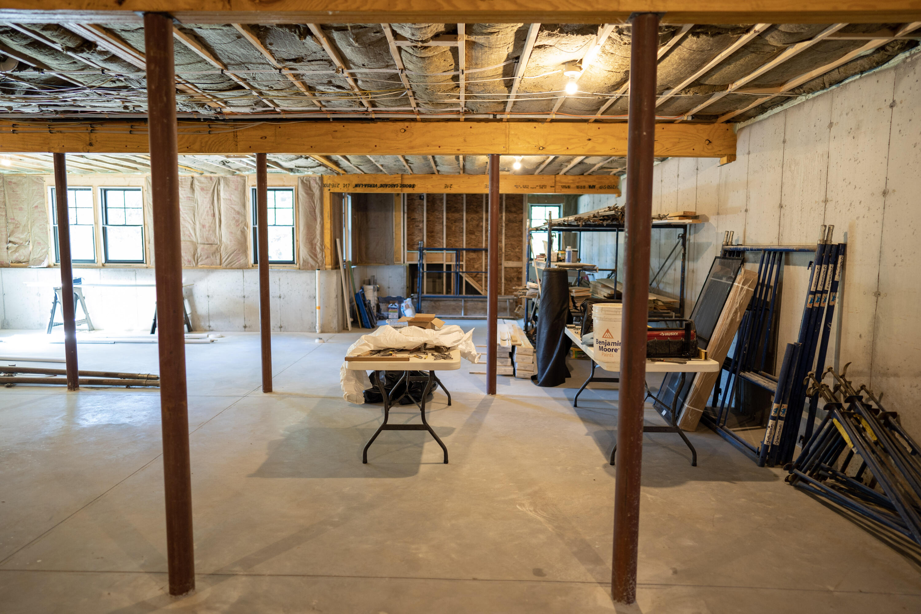 131 Old Barnstable Road Mashpee, MA 02649 - Photo 52 of 93 a living room with furniture a rug and a floor to ceiling window