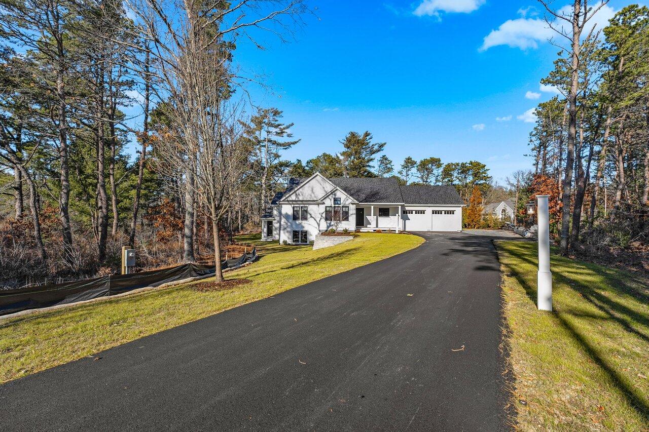 131 Old Barnstable Road Mashpee, MA 02649 - Photo 66 of 93 a view of swimming pool with a yard