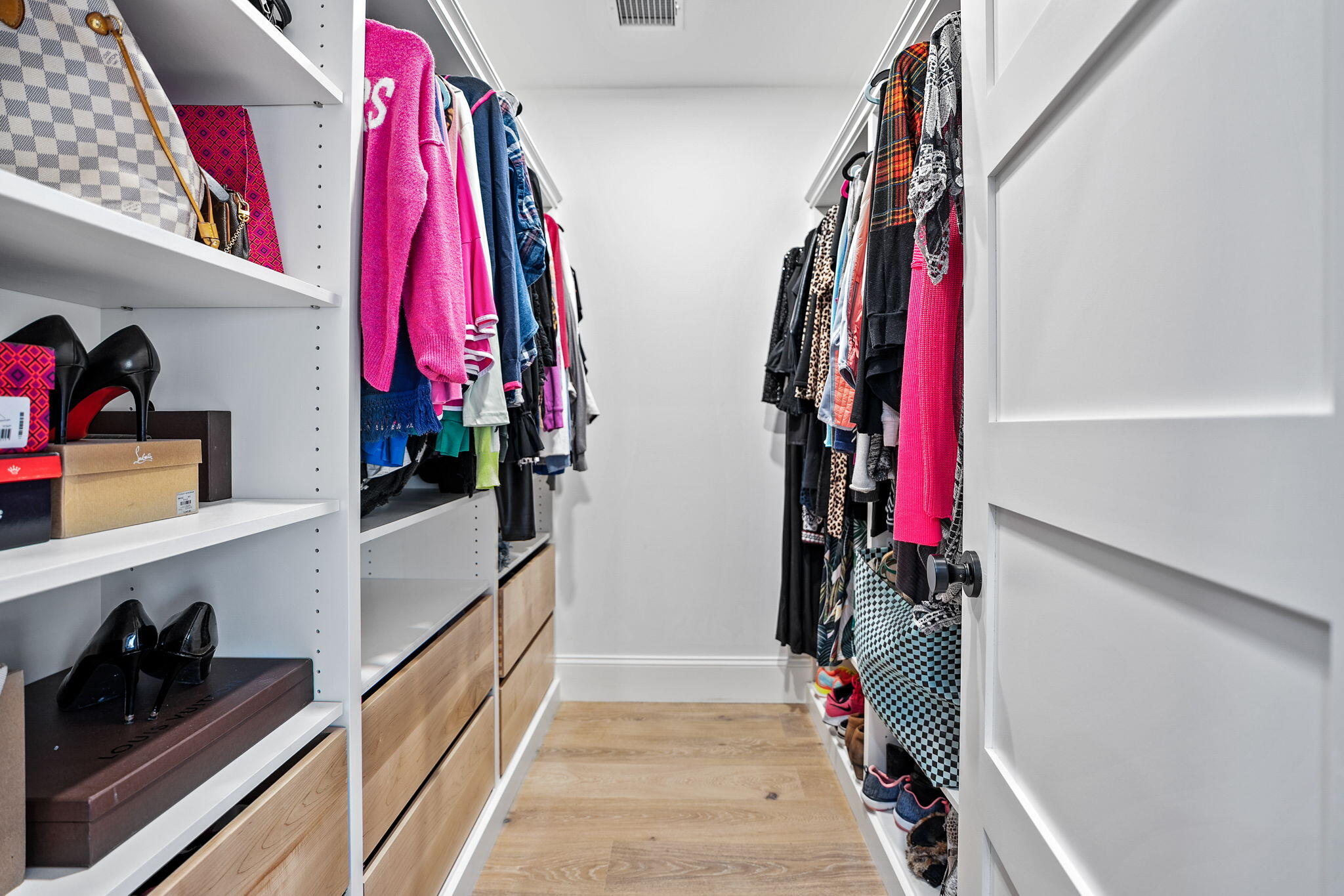 131 Old Barnstable Road Mashpee, MA 02649 - Photo 67 of 93 a view of walk in closet with clothes and shoes