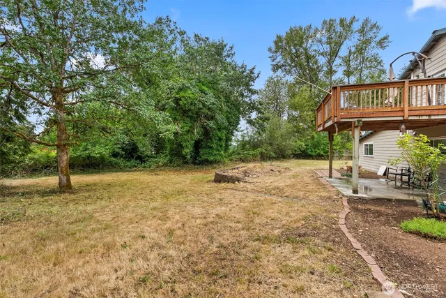 a view of backyard of a house