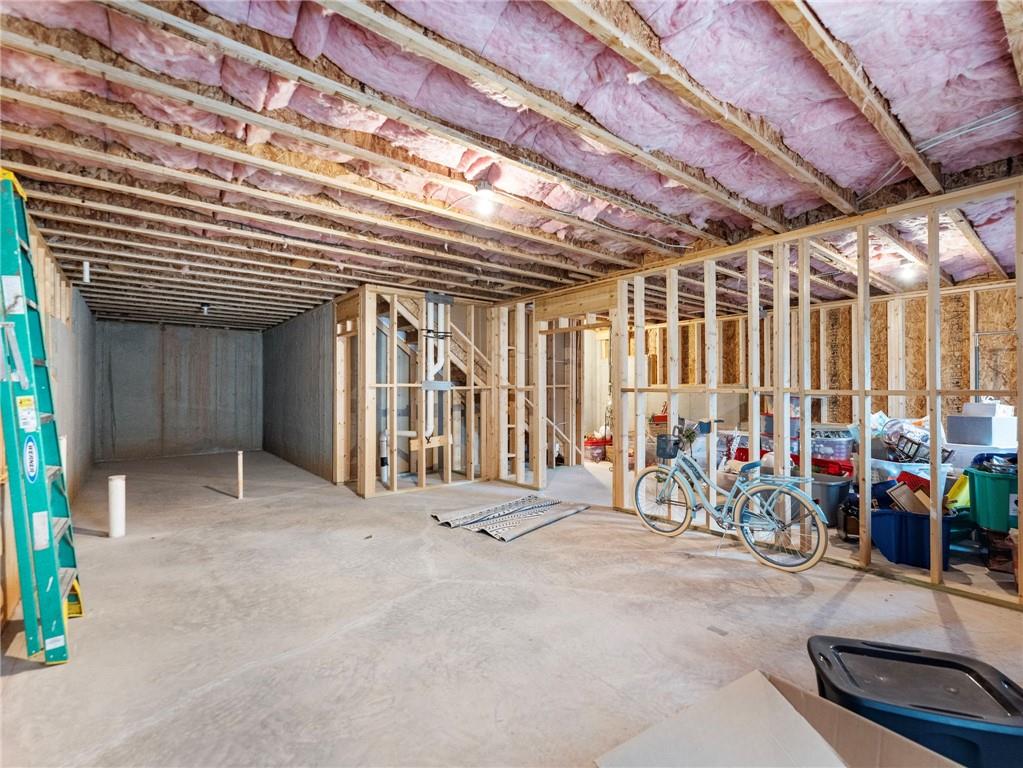 680 Groover Street Ball Ground, GA 30107 - Photo 28 of 42 a view of a room with gym equipment