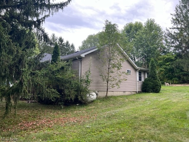 2360 Sheperds Valley Road New Cumberland, WV 26047 - Photo 15 of 16 View of side of property with a lawn
