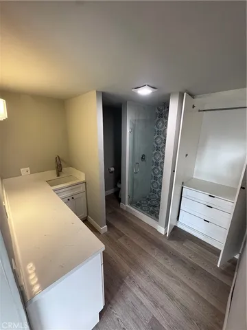 wooden floor and chair in a room