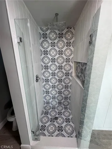 a bathroom with a sink and shower curtain