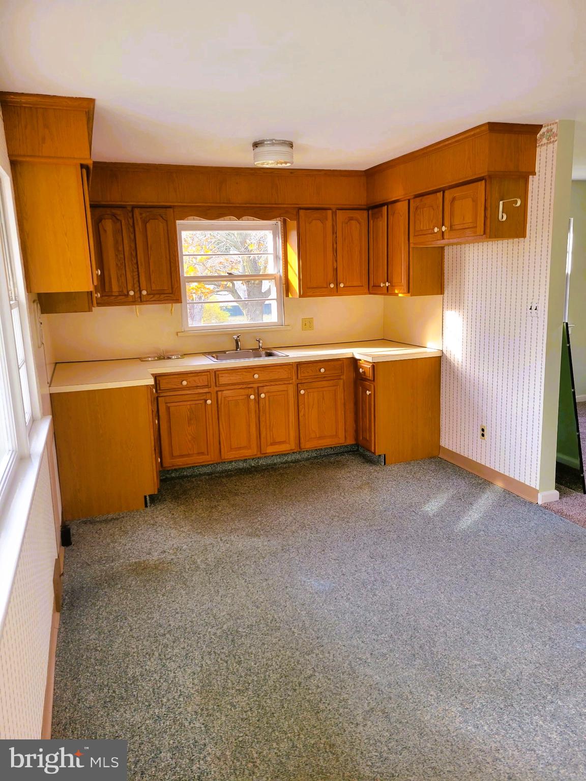 24 Nestler Road Bridgeton, NJ 08302 - Photo 13 of 41 a kitchen with granite countertop a sink and a stove